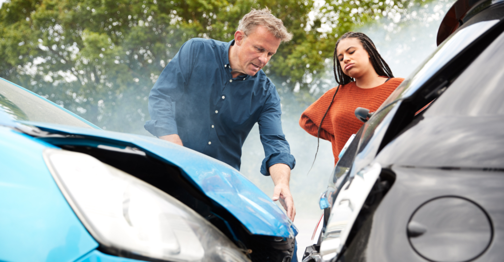 Vehicular accedent with two people arguing